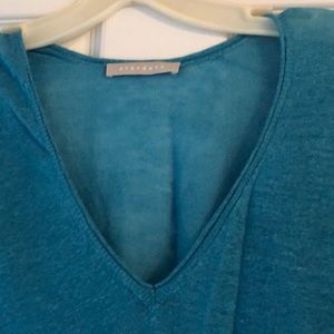 Turquoise layering sweater.